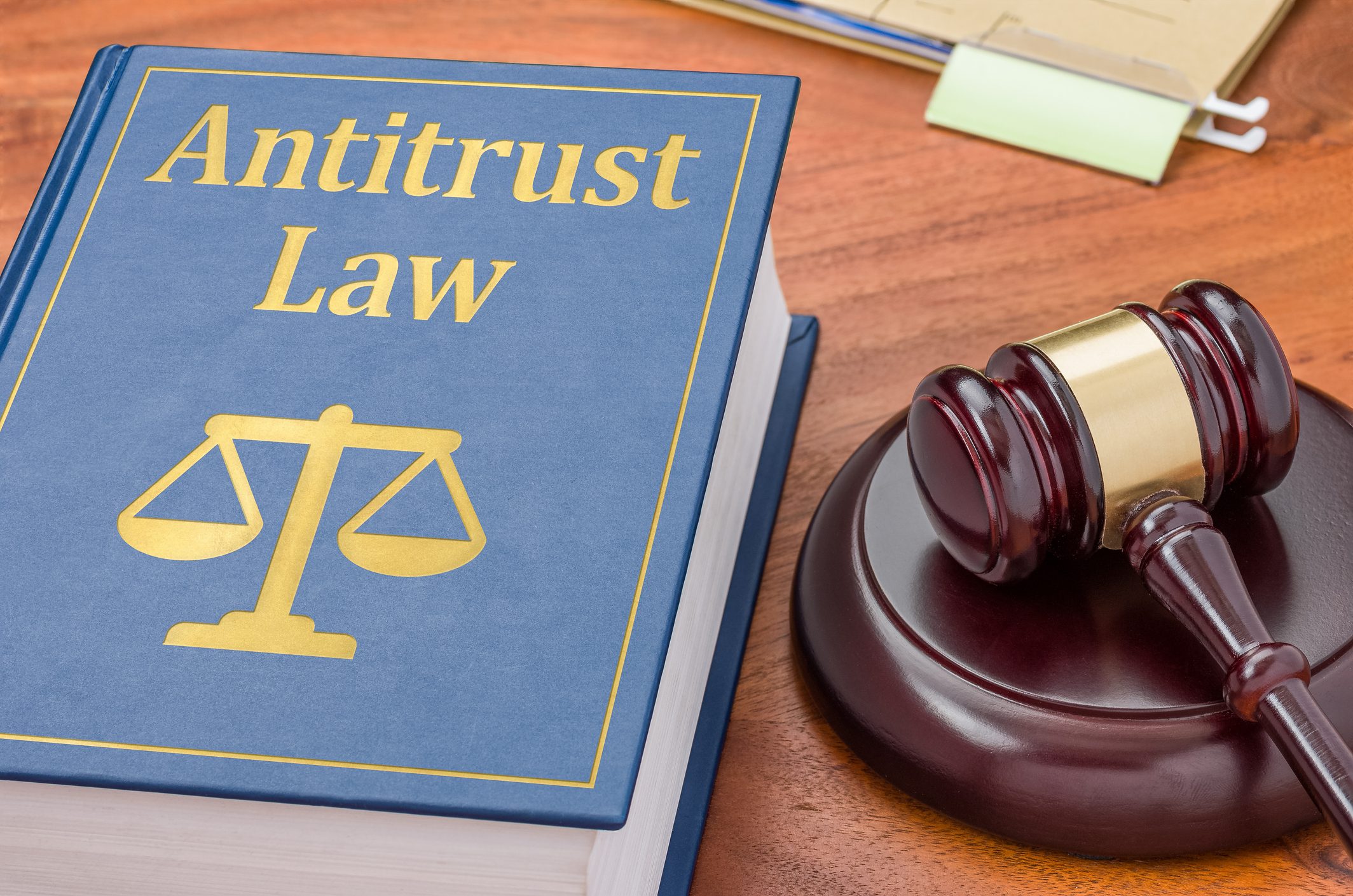 Antitrust law book with judge's gavel