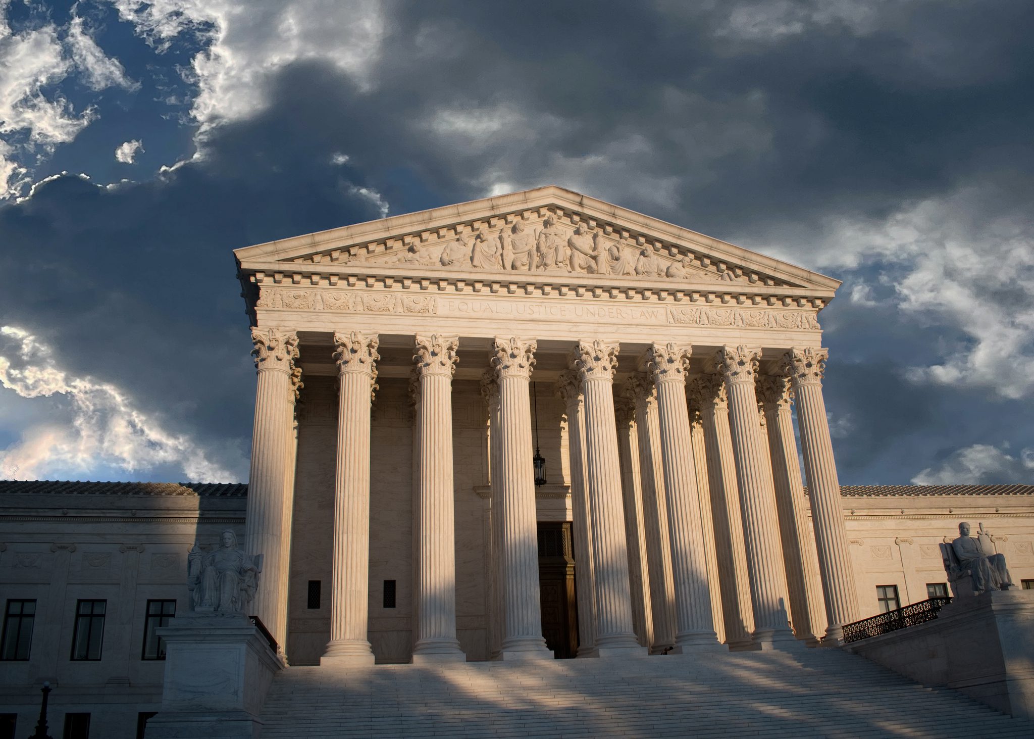 Majestic courthouse facade with stormy backdrop
